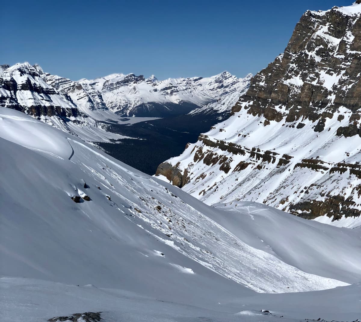 Ski tracks visible just above the crown