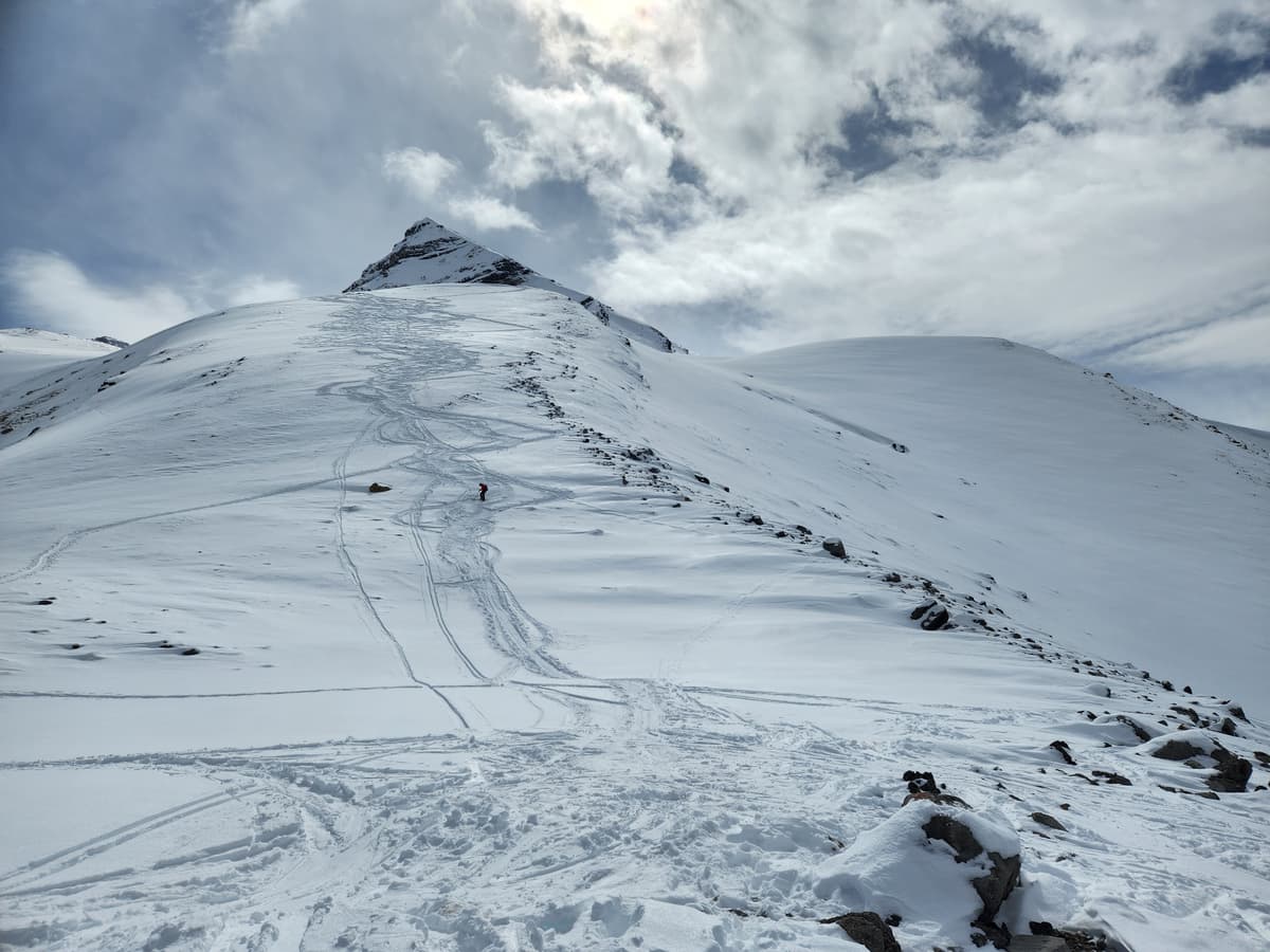Loaded gun slope on the right, skier remote size 2.5 on the left, and the crappy rocky ridge with the tracks in the middle.