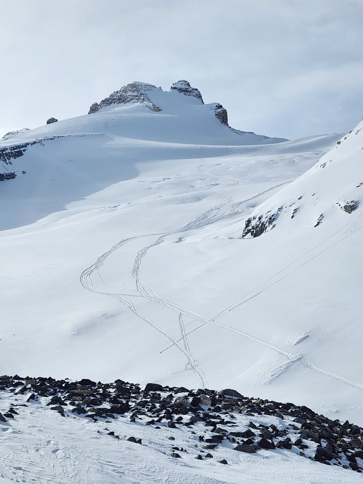 Left side of the glacier (no tracks yet) has less crevasses .