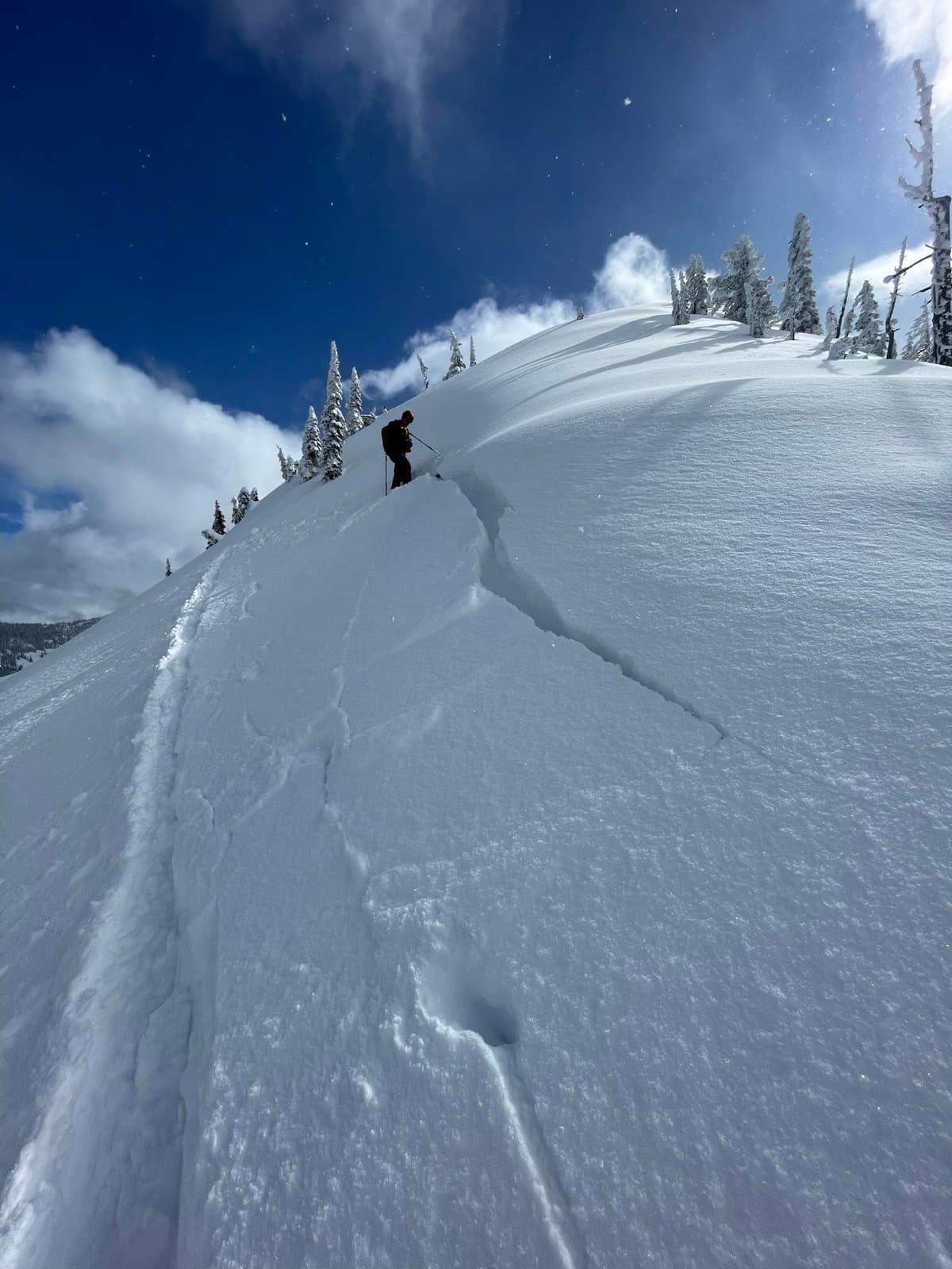 Shooting cracks where the skin-track undercuts the slab on a north aspect ridge line. Turned around an looked for a less steep angle
