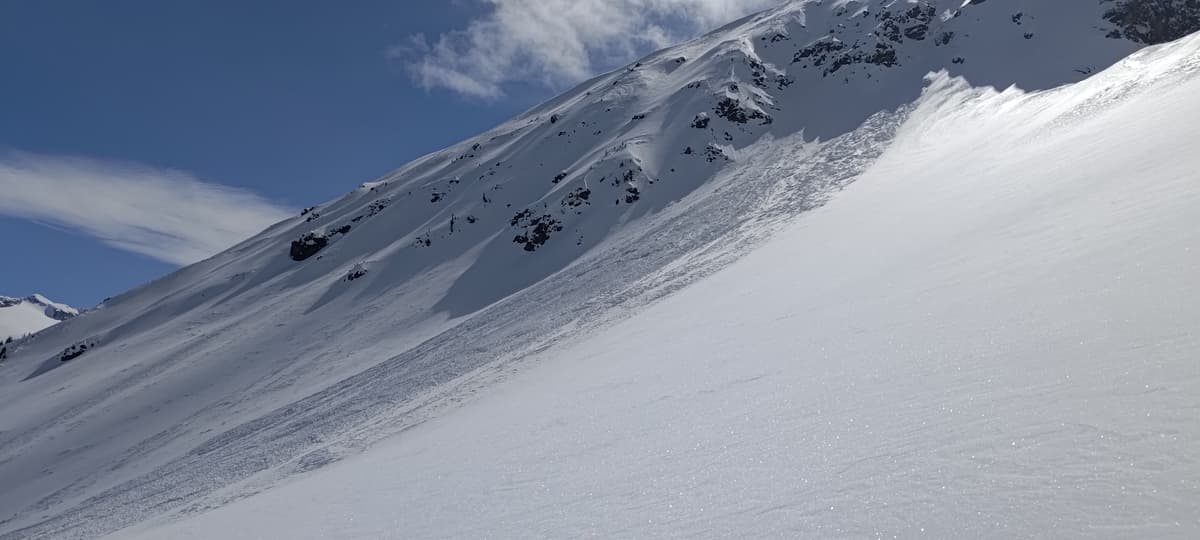 One decent size dry slide coming off the top, either from rocks or a cornice 