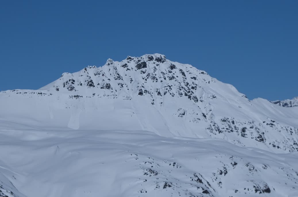 Natural activity on alpine solar aspects specifically around rocks and cliffs. 