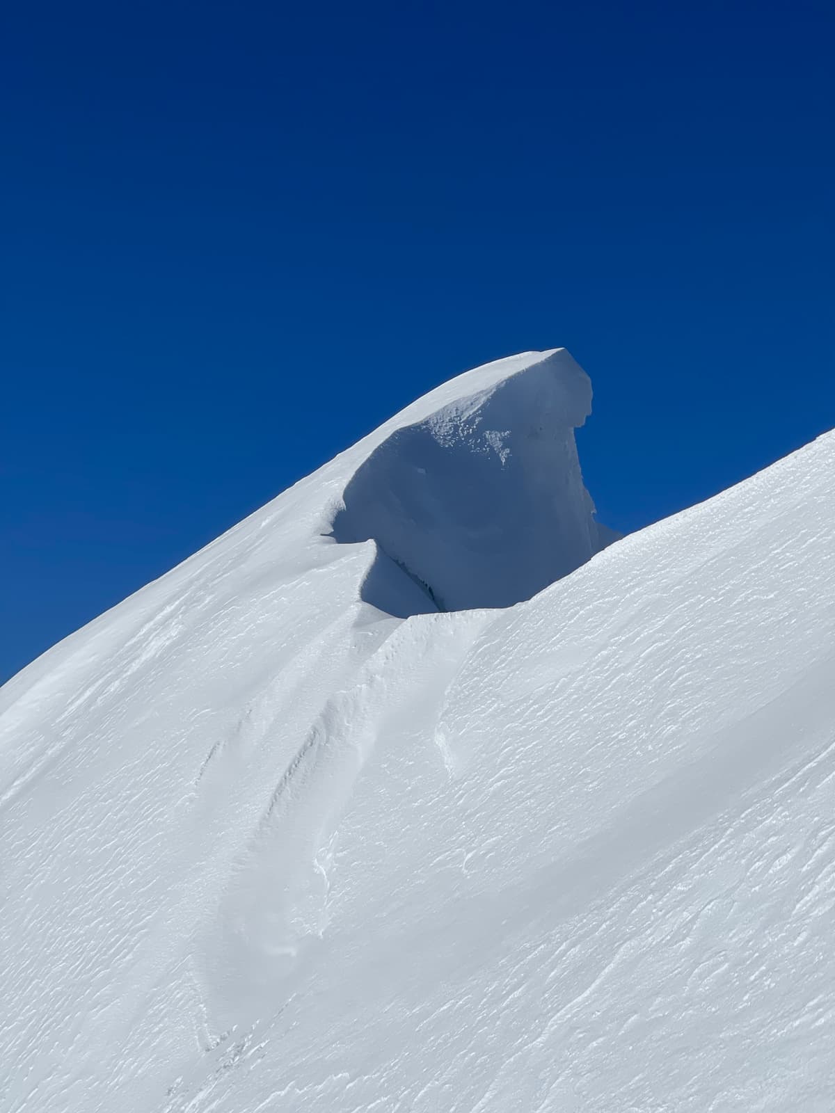 Still has some large and less than friendly corninces near the summit.