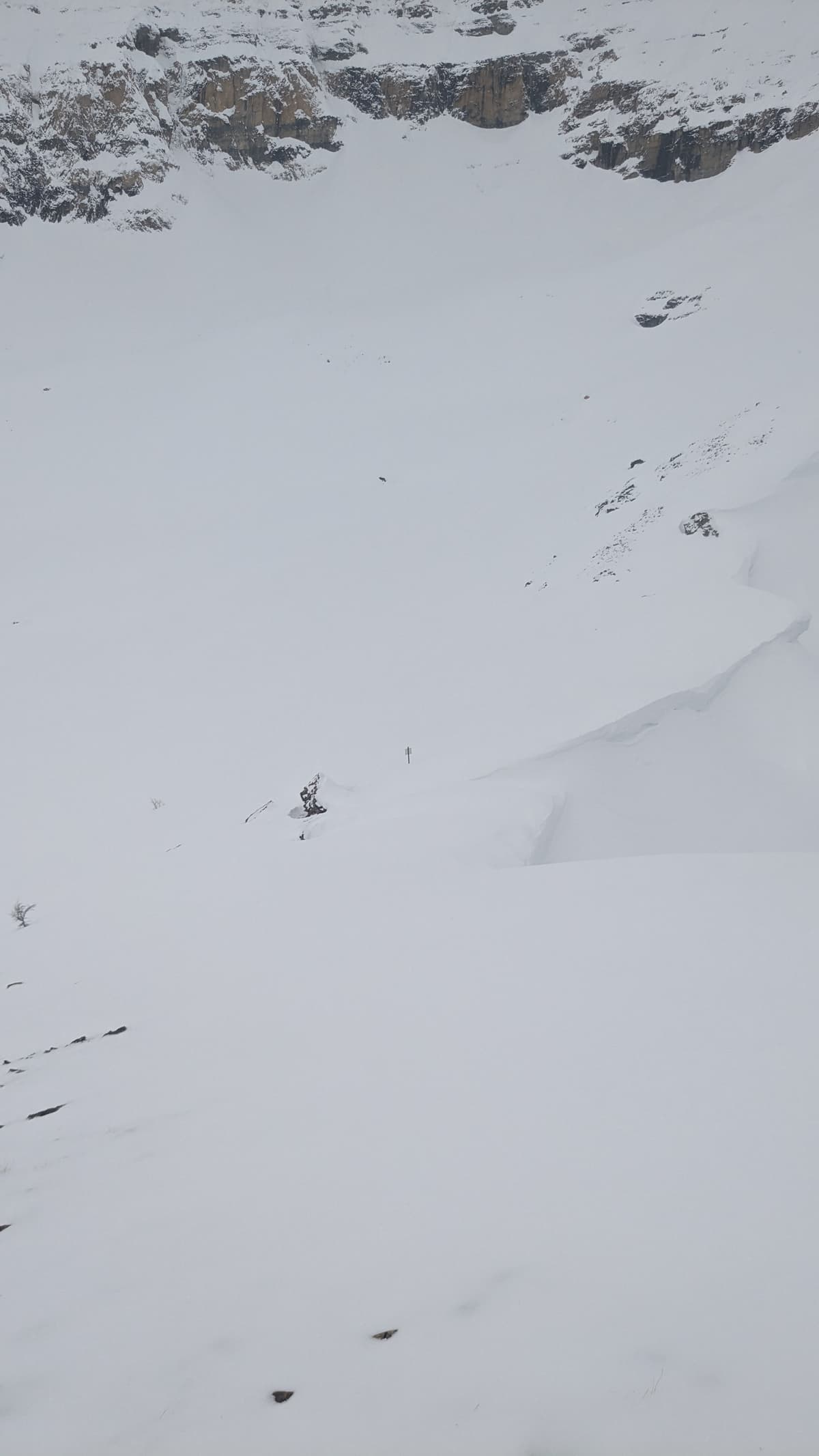 Looking down on the sign. Note the gap in the cornices. That's where we snuck through.