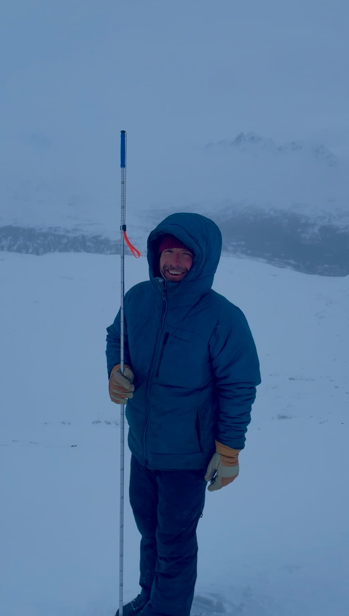 Drew smiles into the cold breeze. 
There is 130 cm total snow depth on the lee side, leading down to the Chilkoot Trail. 