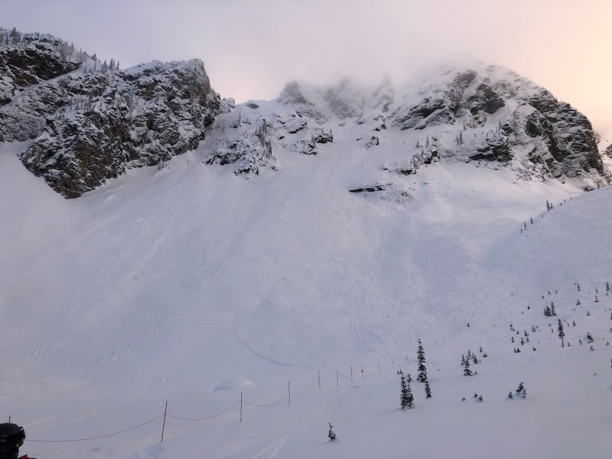 Sz 2.5 Skier triggered SSL 30 deep running far and carried mass to 50 m of boundary line. Intentionally cut multiple pockets in choke and hanging. High risk to skiers on slope without spacing and patrol below. 