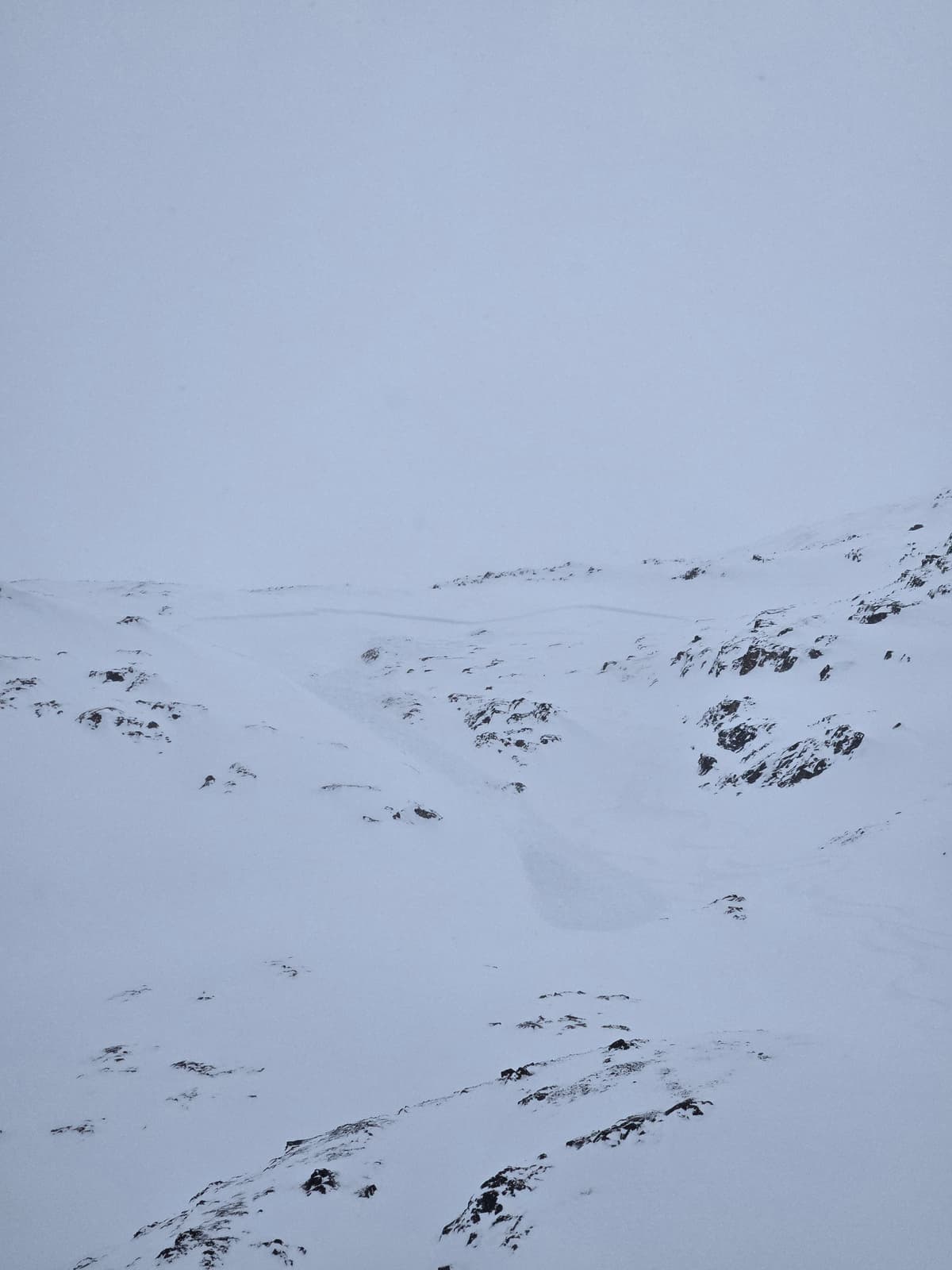 A view from the east side of of the Crater Lake basin looking back showing the width and length of slide. 