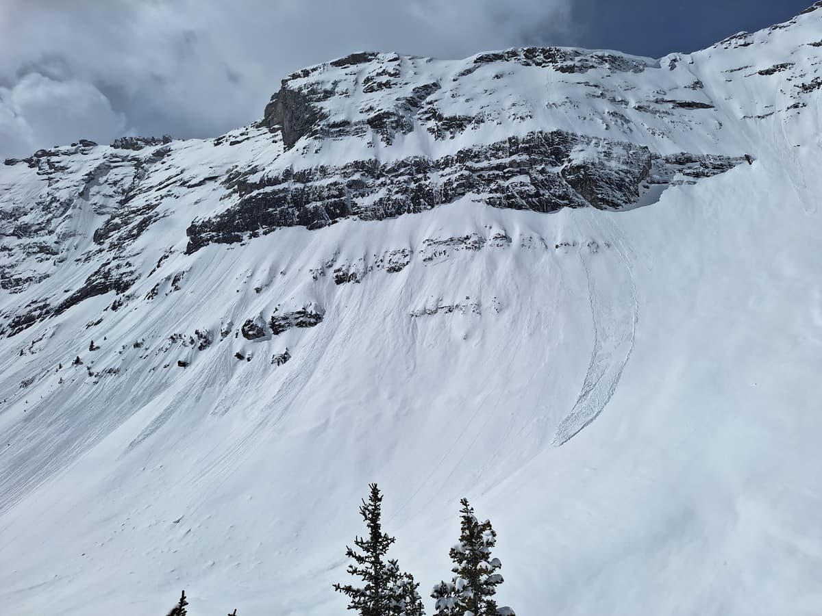 Passing under the headwall on the way up to the col