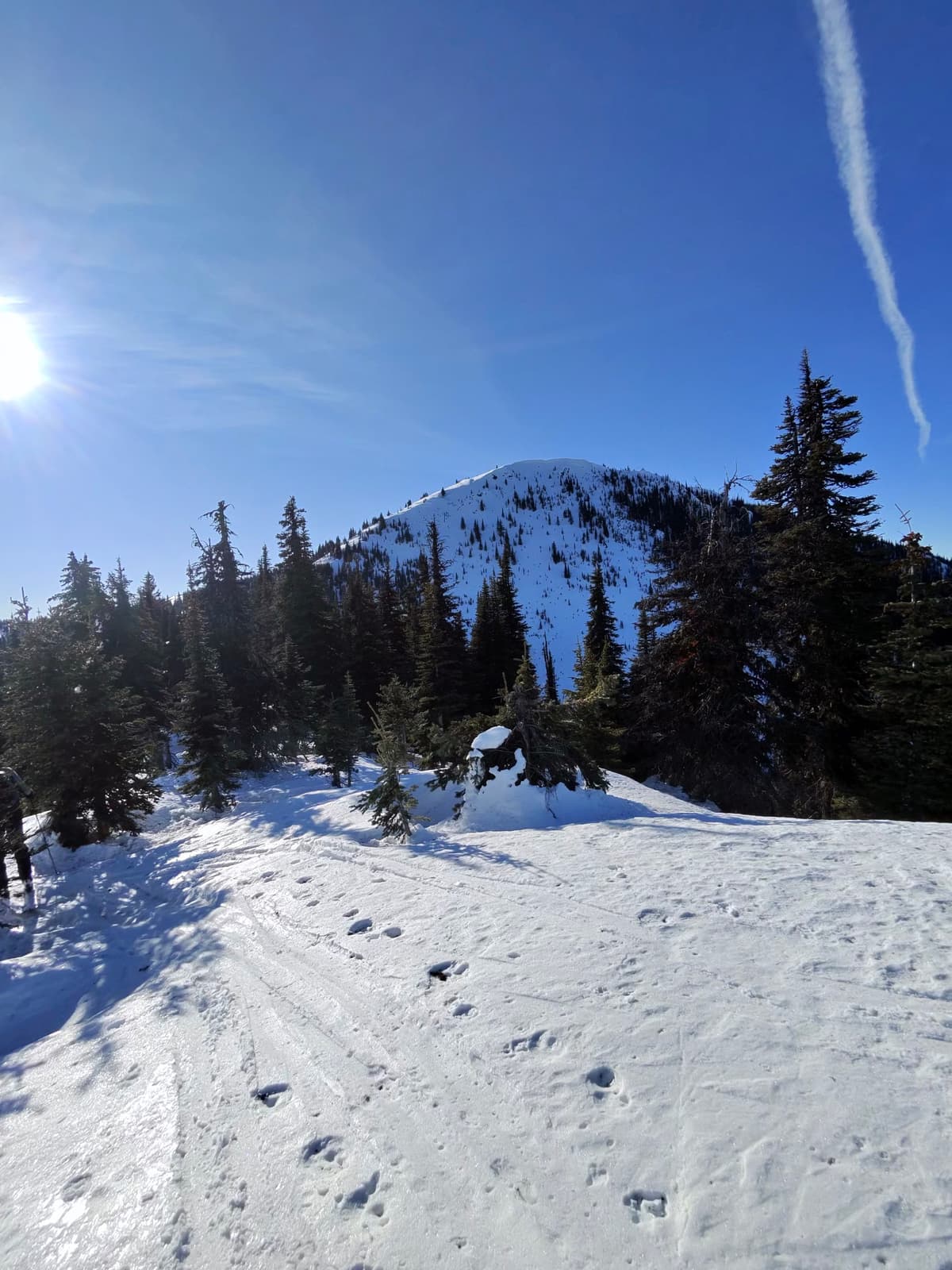 shallow ski penetration at summit shows conditions are hard and crusty 
