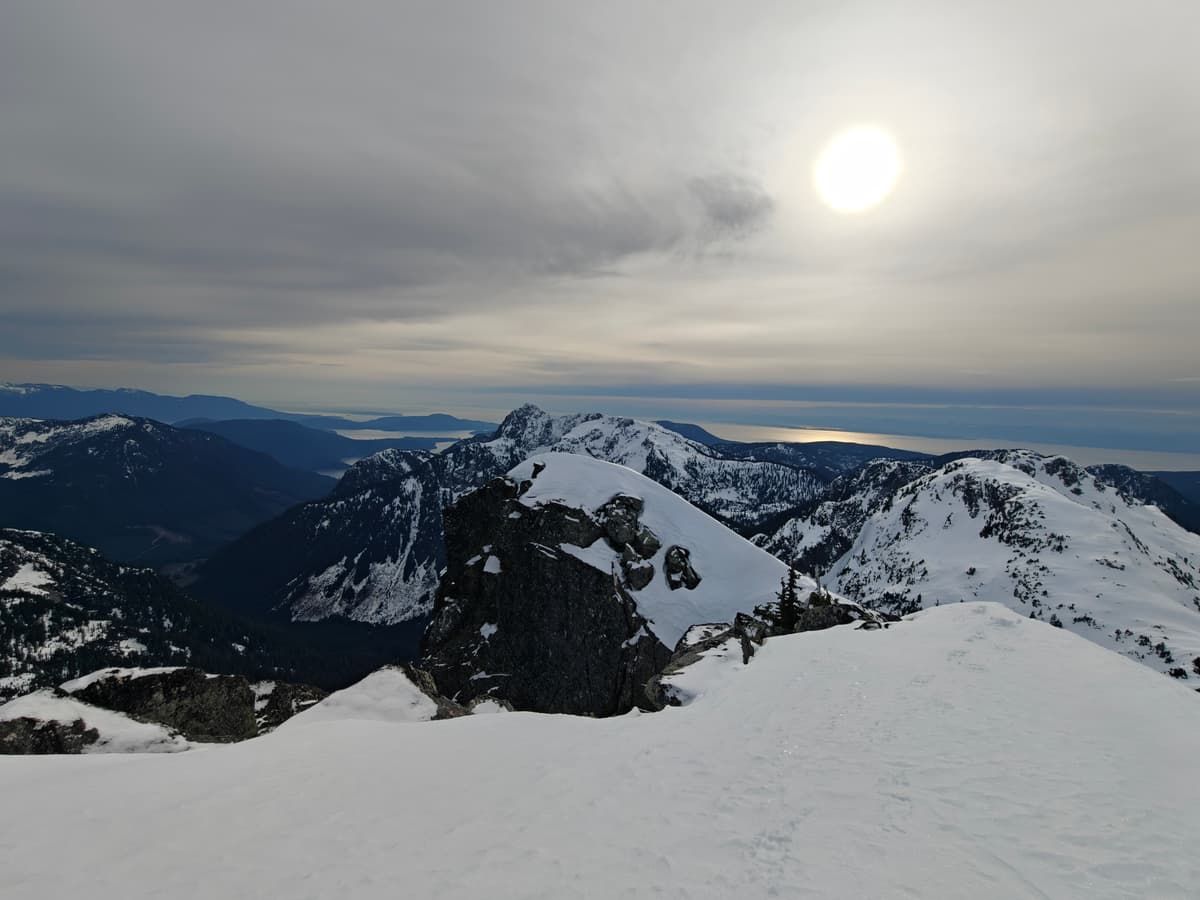 Wide angle view of the false summit and panther in the background 