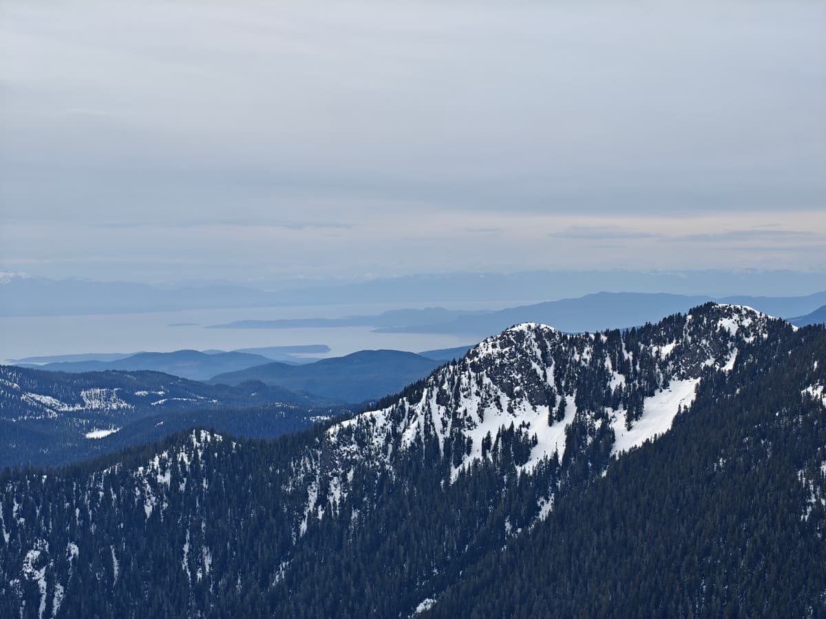 Zoomed in photo of Mount Steele with Vancouver Island in the background 