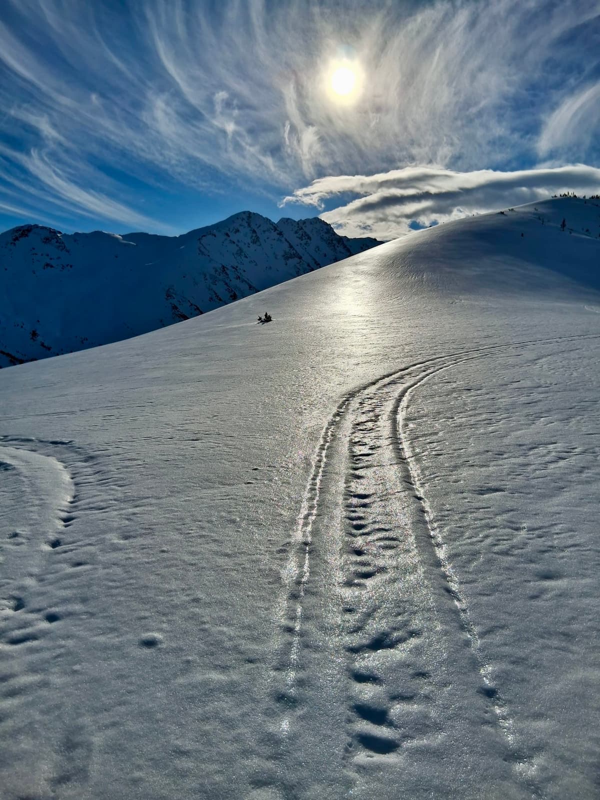Thin crusts held on at 2100 m on polar aspects.