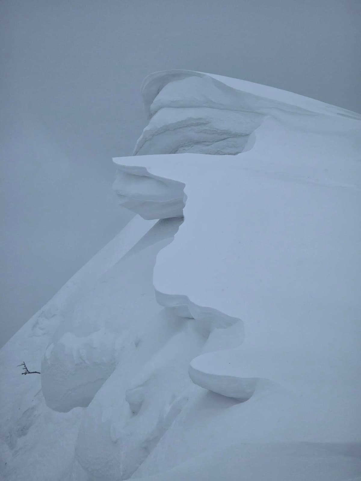 Cornices building at ridgetop