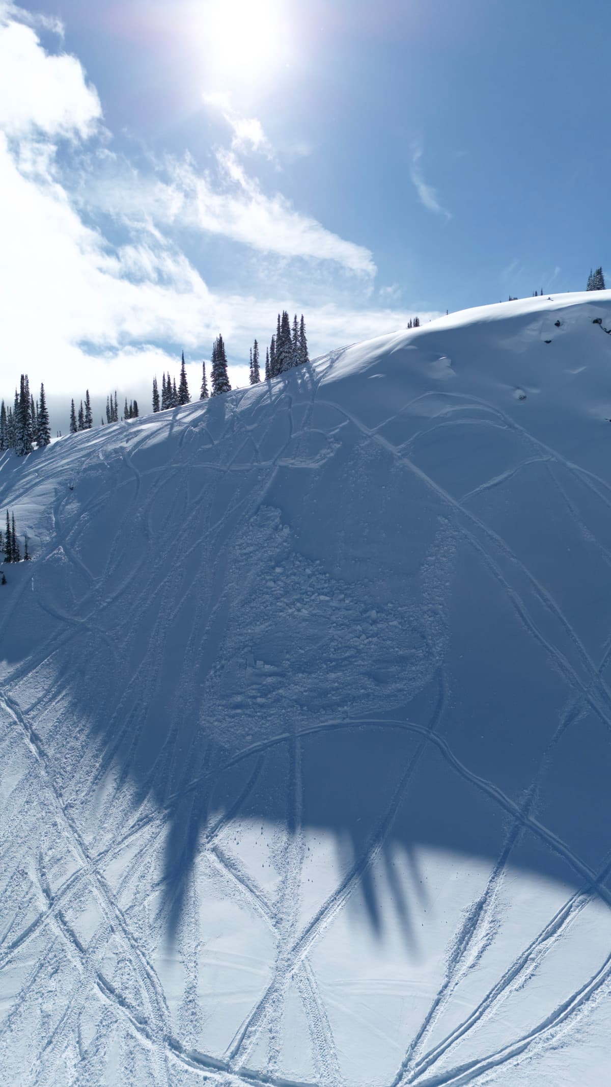 Sled cutting up from right side of photo triggered slide