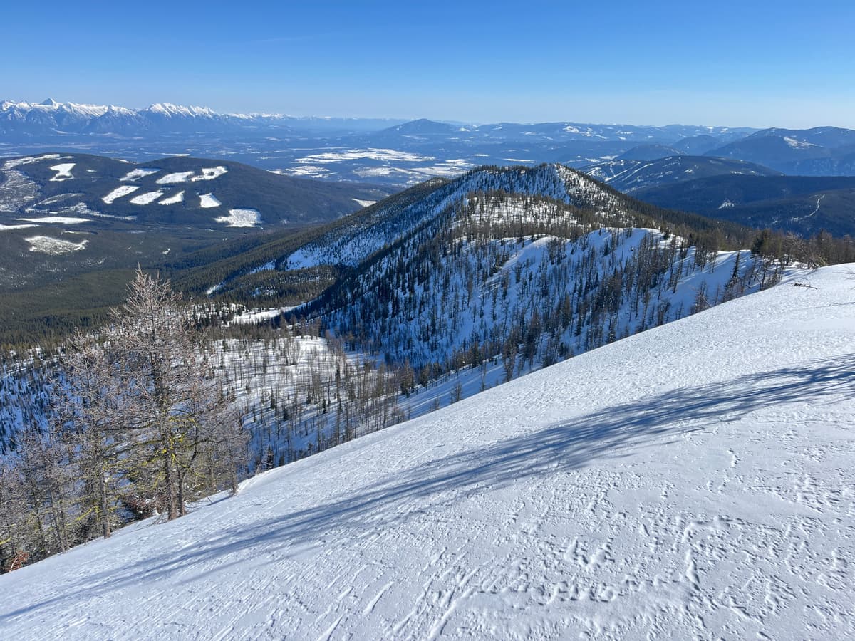 Sunny skies and wind affected snow