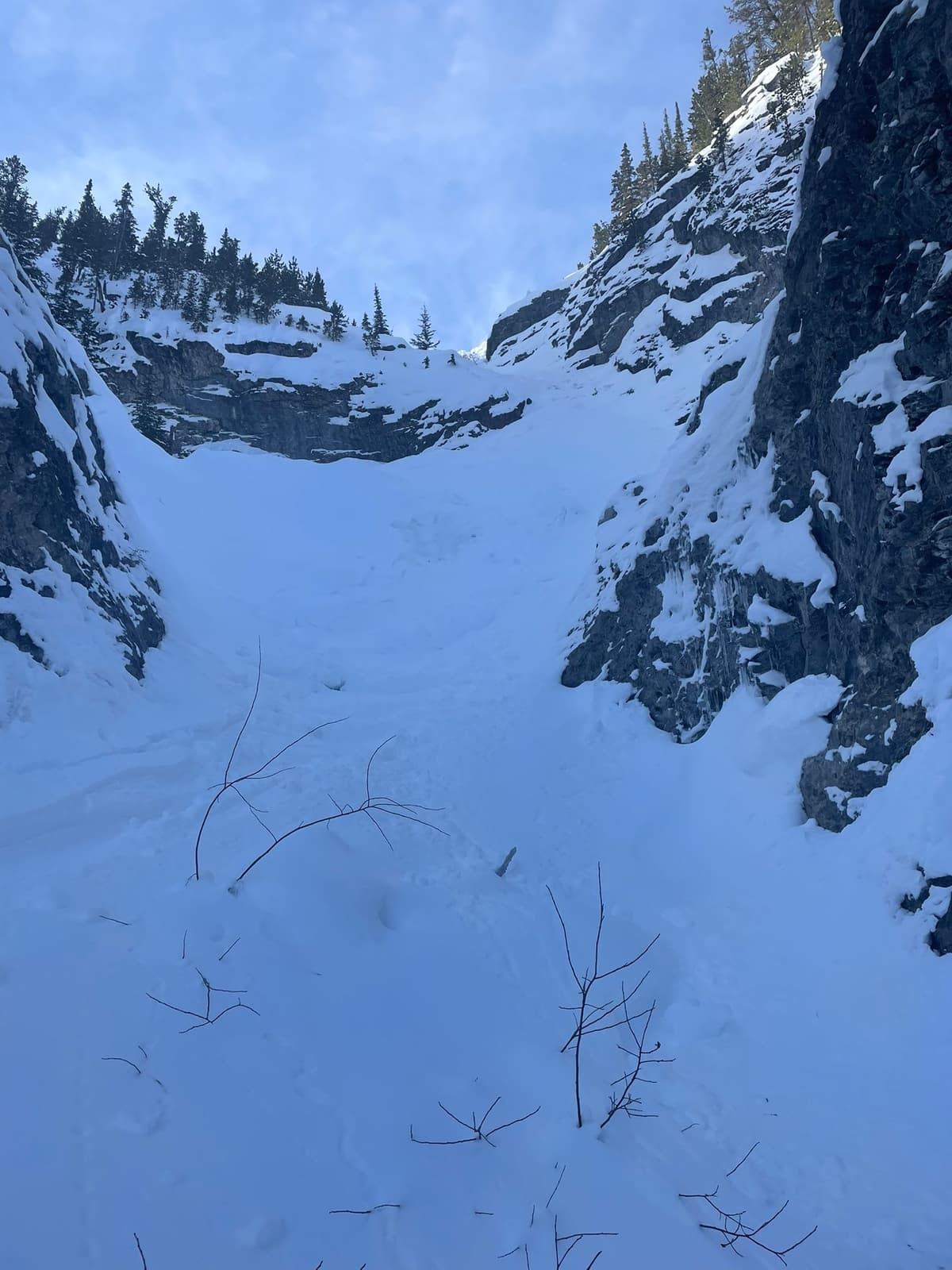 Looking up toward the filled in first rappel, thanks avalanches!