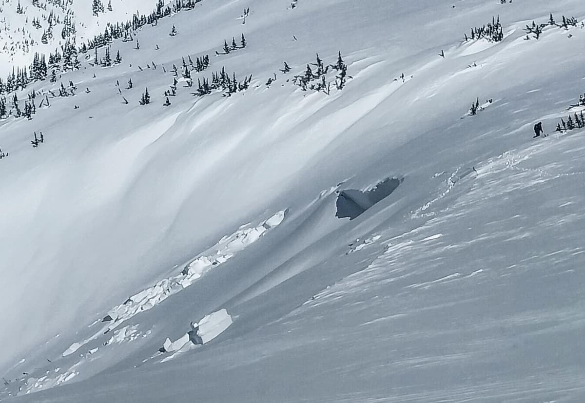 While most of the fracture line had blown in you can see here where part of it was still visible and very deep. For size reference, you can see the person in the top right corner of the photo.