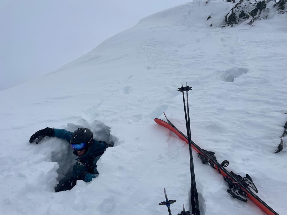 Partner fell into a snow moat close to cornice
