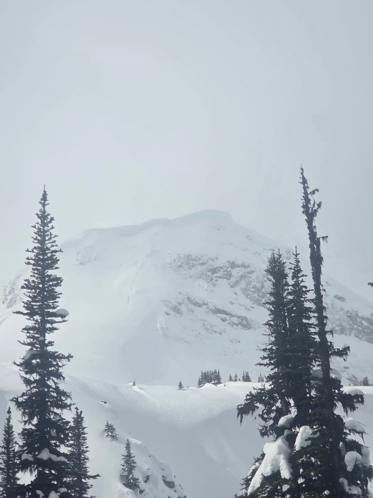 You can see the holes from the cornice failure lower on the slope, it looked like more cornice had failed further around the ridge too