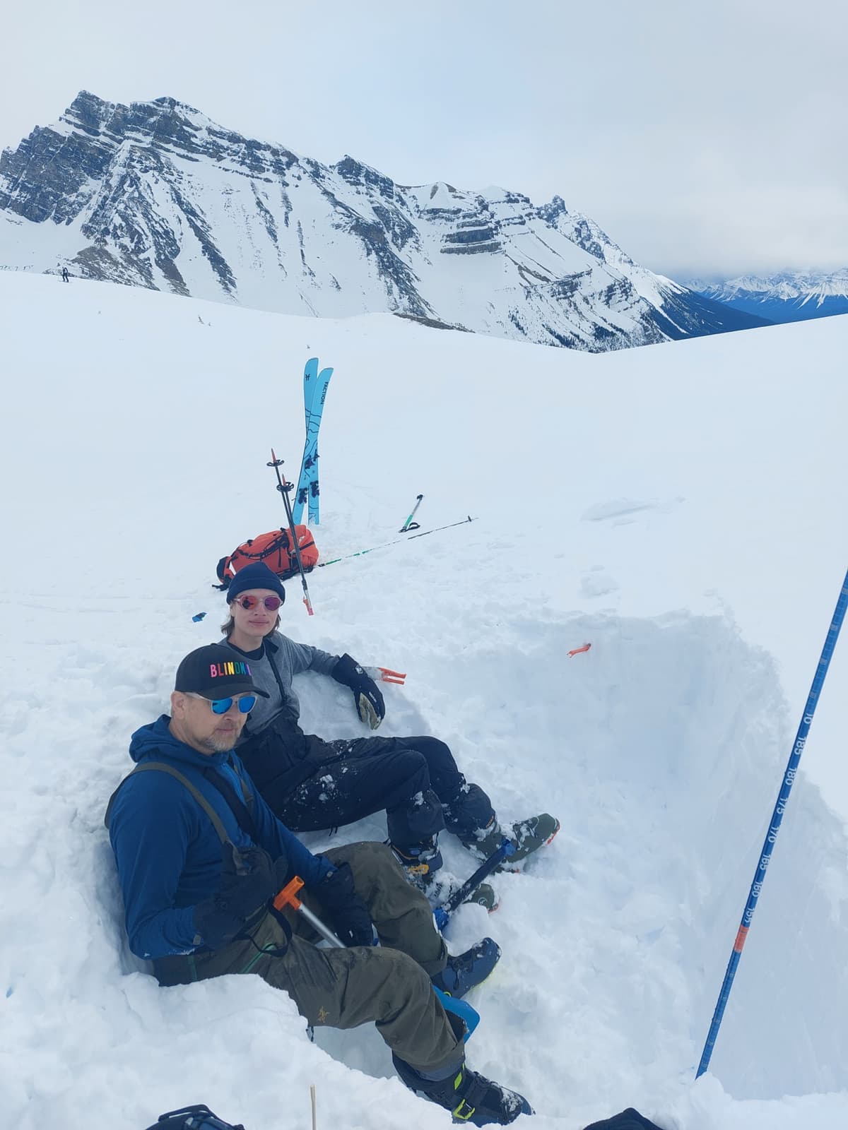 Snow pit couch surfing. Hard day in the alpine.