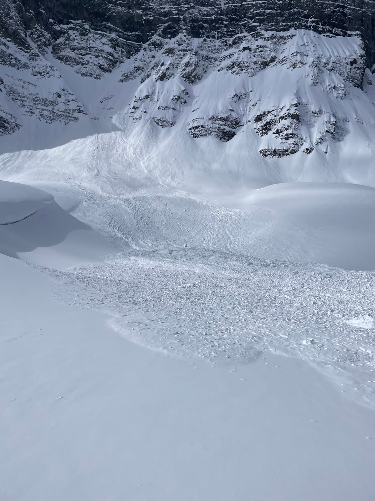 Natural avalanche on the west wall aproaching Bow Peak
