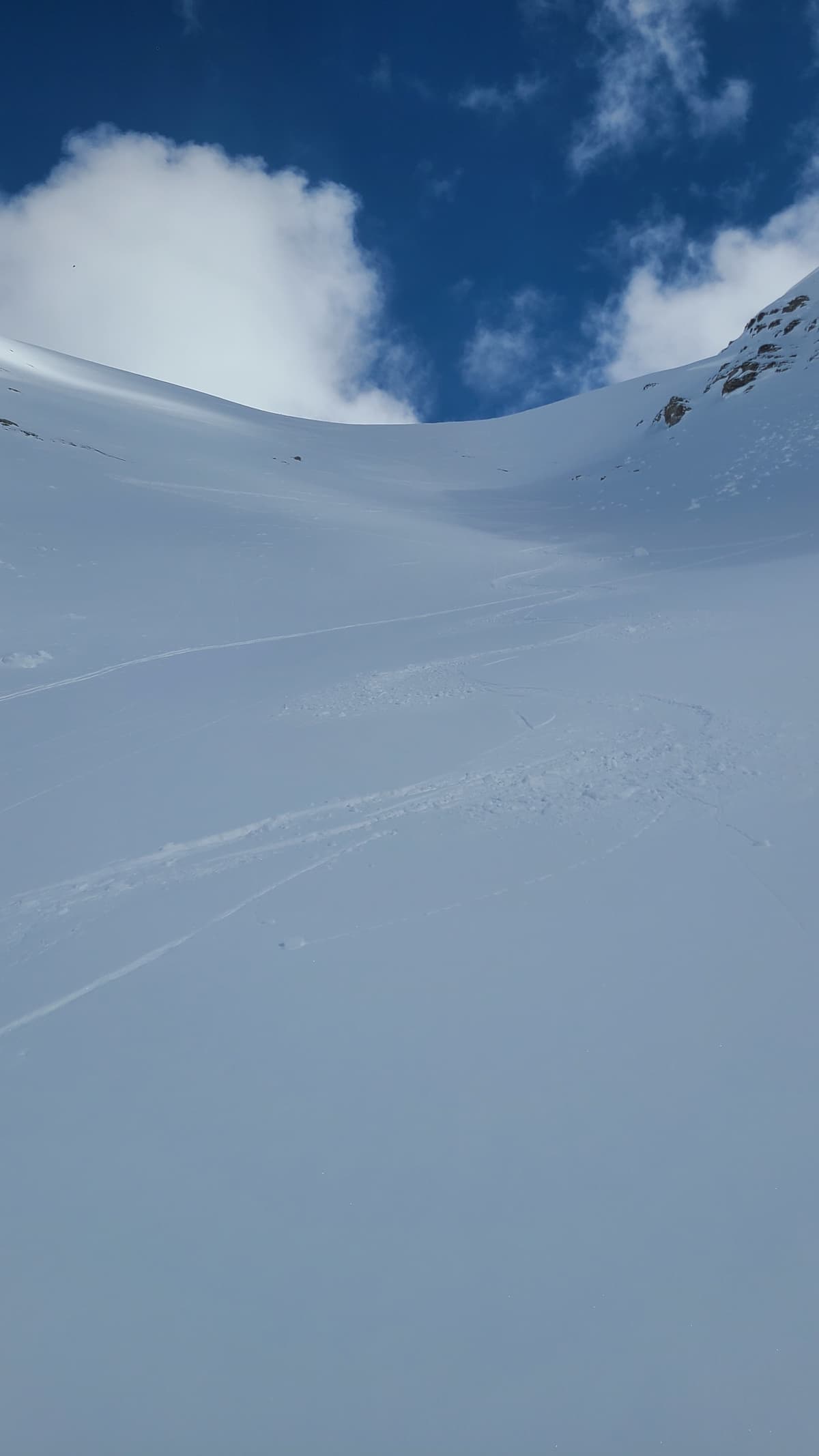 The bowl below the steep slope had great snow, but a few death cookies here and there. 