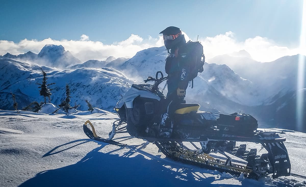 You can see the wind transported snow blowing off alpine ridge tops in this photo.