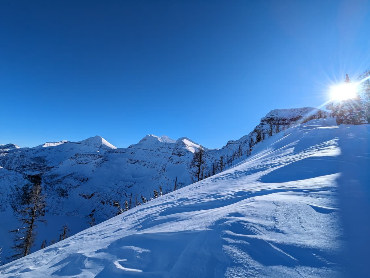 Looking south above the slide path - note the wind affected snow.