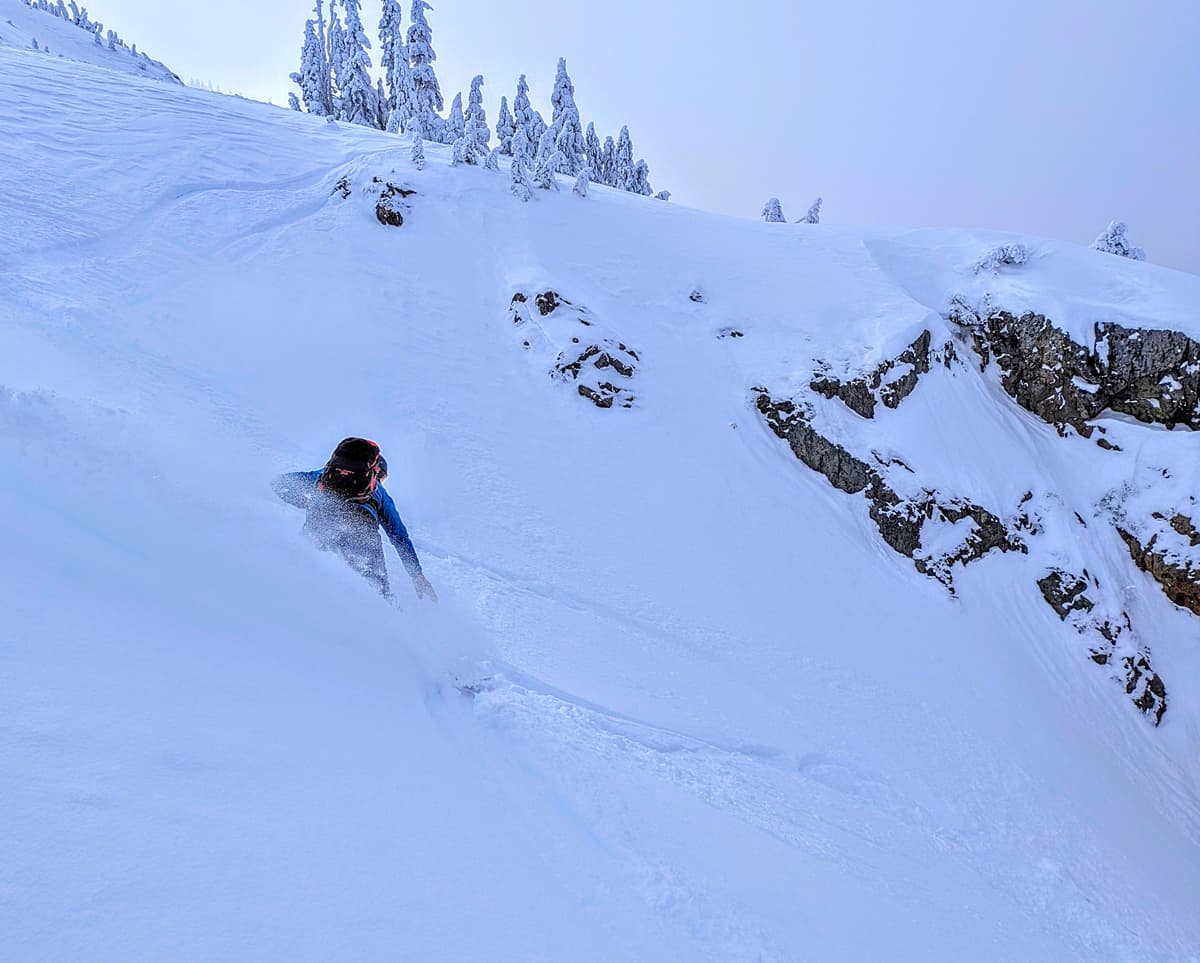 Snowboarder NE bowl. Great stable powder