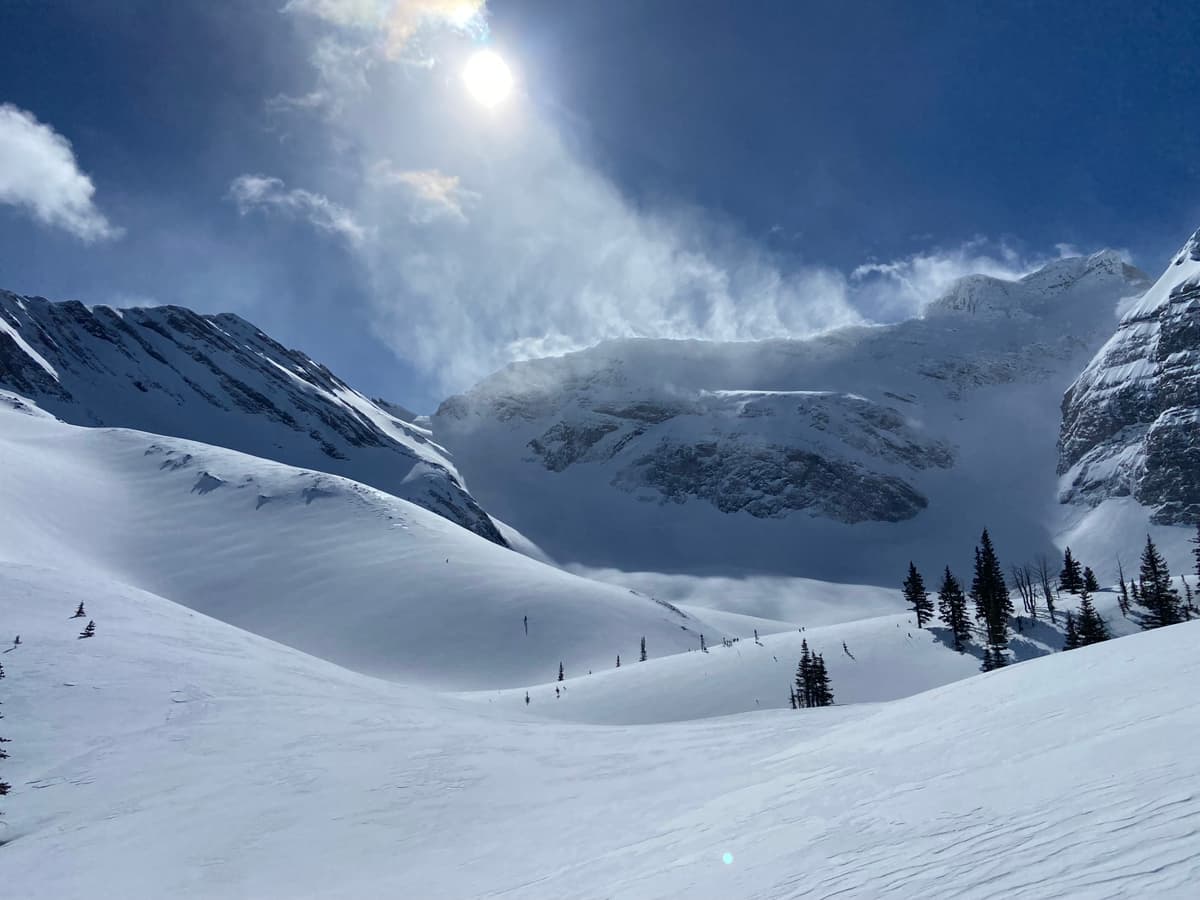 Gusty winds on the summit ridge but generally light winds where we skied