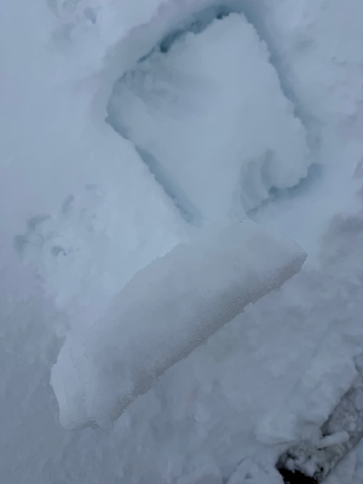 Ski pole snow pit. Crust under Weds new snow with unbreakable ice crust down 30cm from surface.